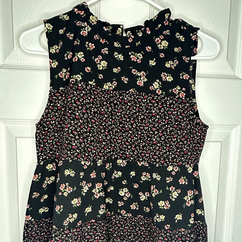 Black Flora blouse sleeve-less with mini ruffle neck line